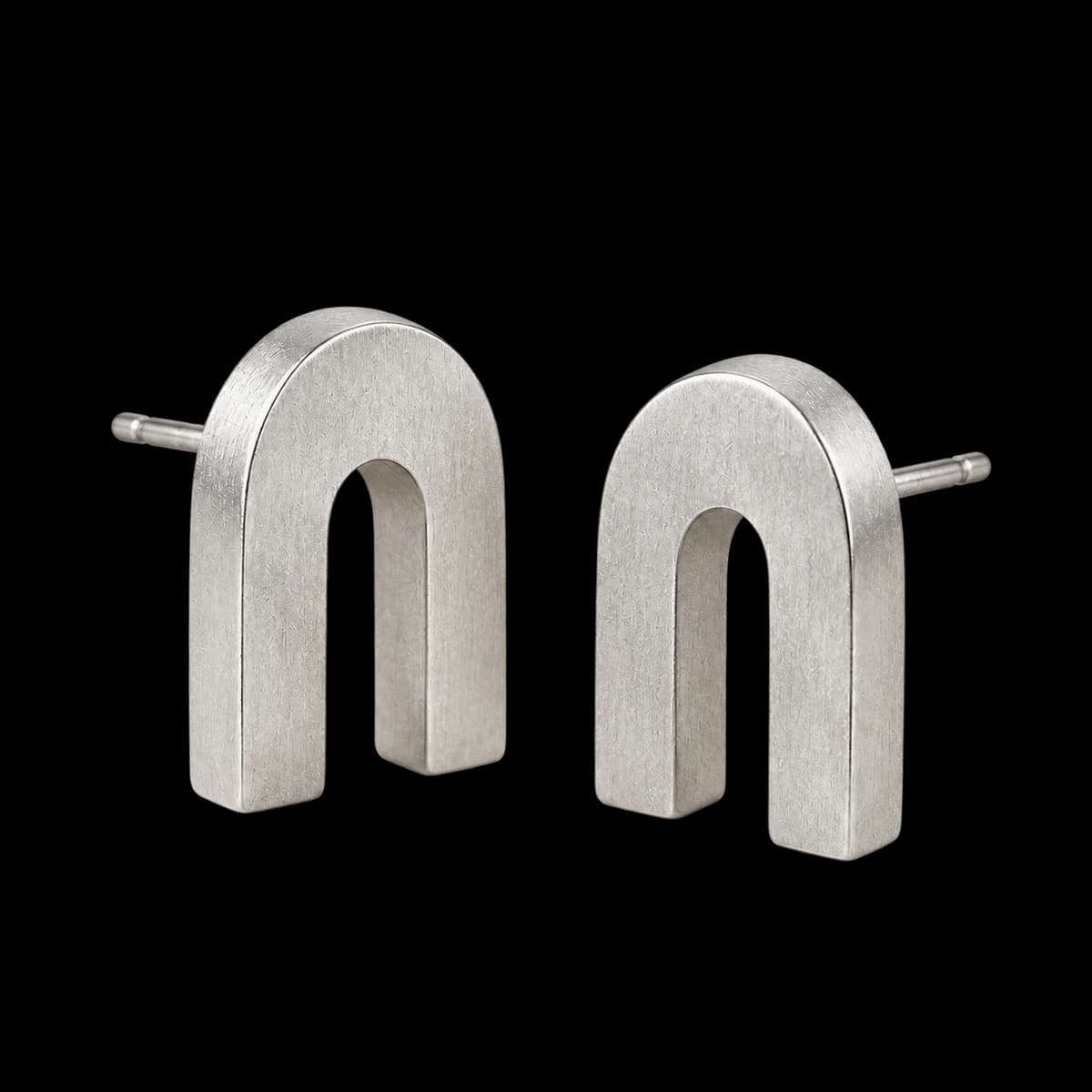 Columnar Arch Studs, Stainless Steel — studio view