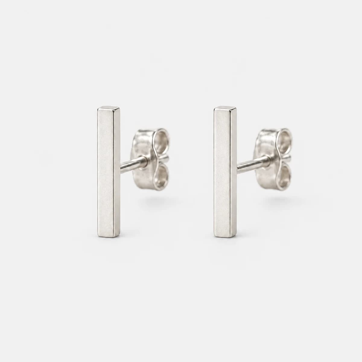 Hairline Bar Studs, Stainless Steel — studio view